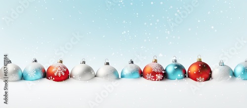 Snow covered in Christmas decorations isolated pastel background Copy space © HN Works