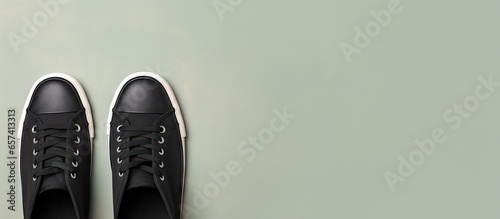 Shoes in black color isolated pastel background Copy space