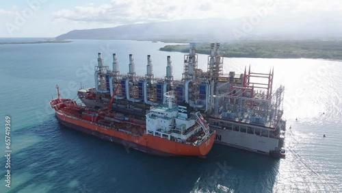 Aerial View Of Dry Cargo Ship At MV Karadeniz Powership Dogan Bey, A Floating Power Plant In Azua, Dominican Republic. photo