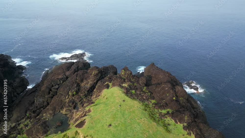 Breathtaking View Of Binurong Point With Rugged Cliffs Offering Stunning Coastal Spot At Baras In Catanduanes, Philippines. aerial Breathtaking View Of Binurong Point With Rugged Cliffs Offering Stunning Coastal Spot At Baras In Catanduanes, Philippines. aerial