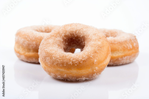 photo of three plain donuts
