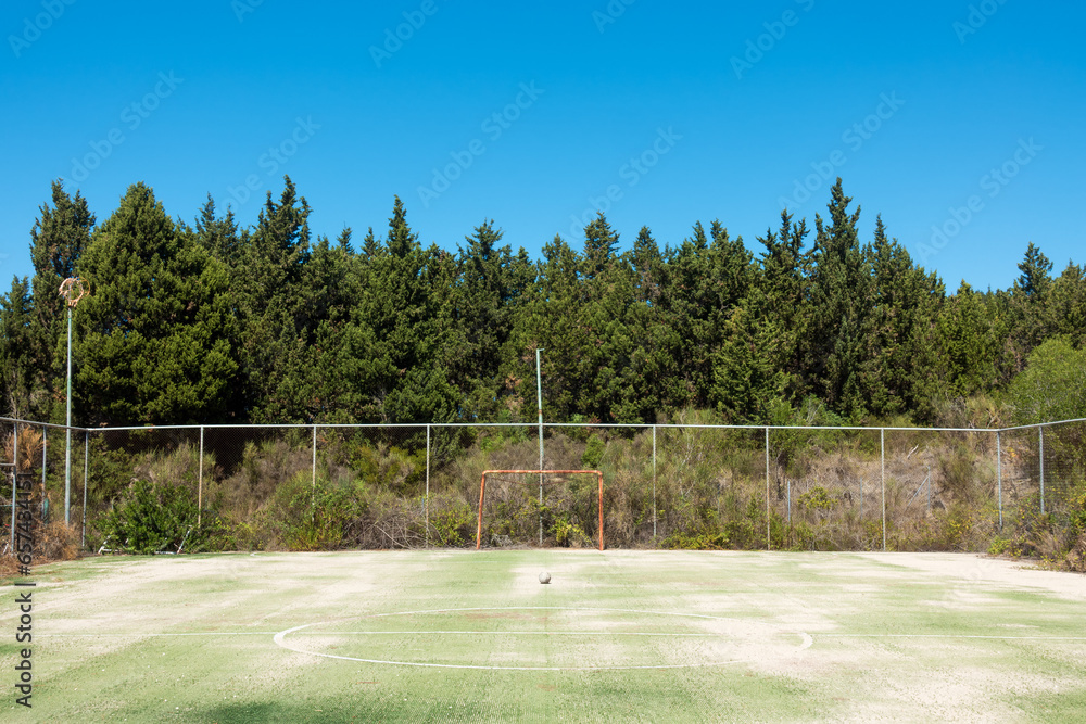 Obraz premium The abandoned football field in Mathraki island, Greece