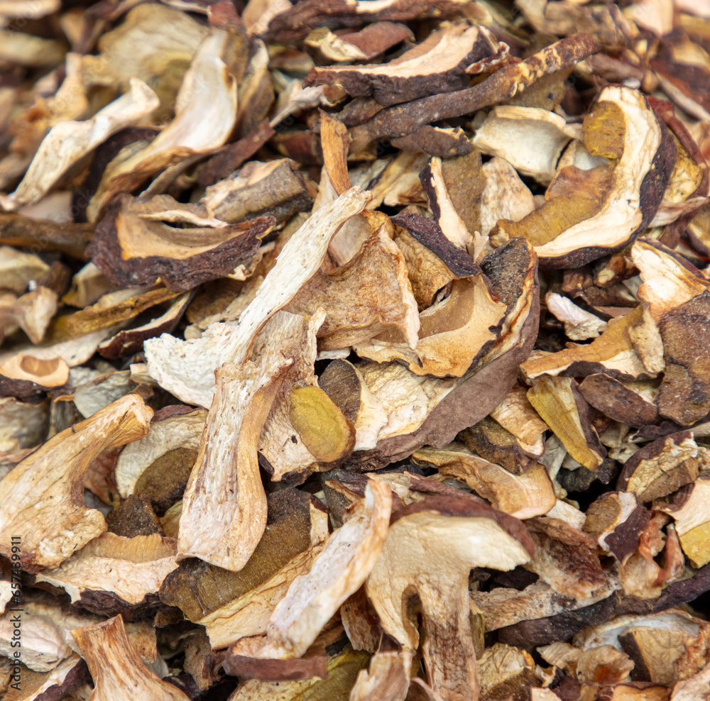 Dried porcini mushrooms as a background. Close-up Dried porcini mushrooms as a background. Close-up
