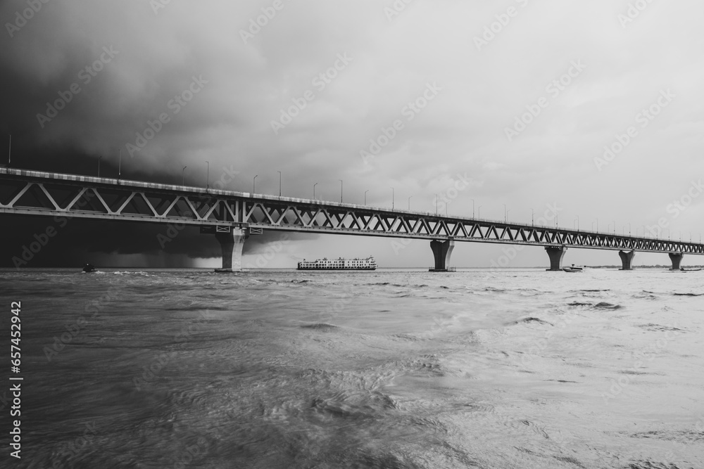 Fototapeta Most extensive Padma bridge photography under the dark cloudy sky