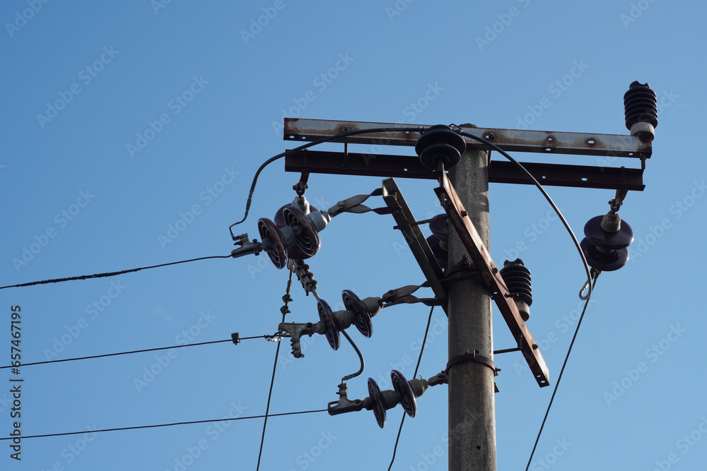 electric pole with blue sky background electric pole with blue sky background