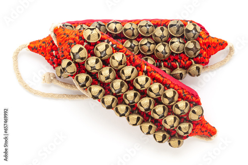 India's traditional Dancing Bells Ghungroo made of brass and crafted in thread isolated on white background. Top view. photo