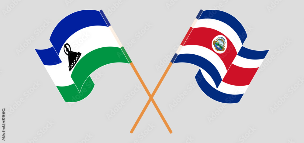 Crossed and waving flags of Lesotho and Costa Rica Crossed and waving flags of Lesotho and Costa Rica