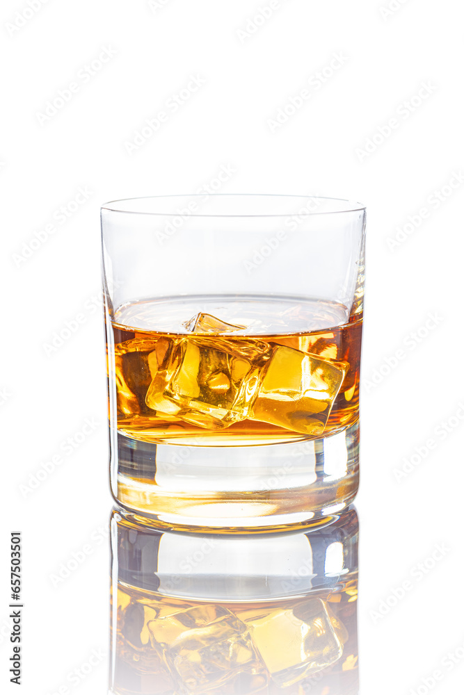Glass of whiskey or other alcohol isolated on white background.