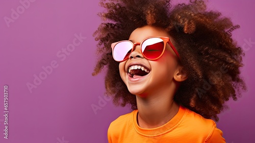 Cute little african american baby laugh with sunglasses