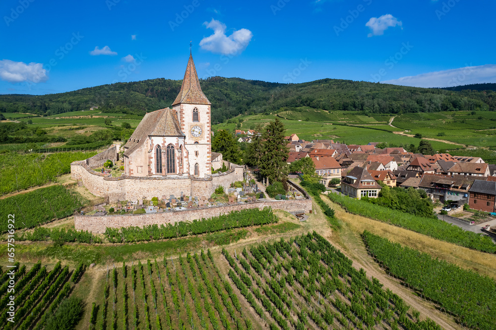 Aerial flyover view of the beautiful French Village of Hunawihr in Alsace France	