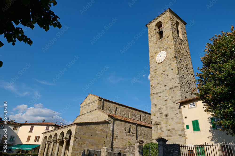 Reggello. Tuscany Region. Italy. September 2023. Medieval church with chapel over blue sky background