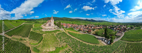 Aerial flyover view of the beautiful French Village of Hunawihr in Alsace France 