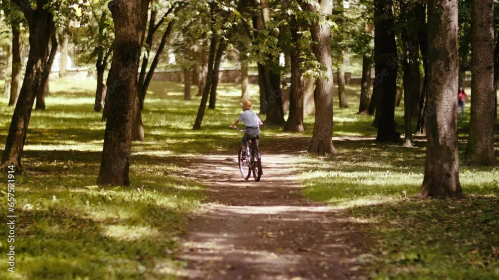 Sunny Day Bike Ride: Boy's Adventure in the Vibrant City Park Sunny Day Bike Ride: Boy's Adventure in the Vibrant City Park