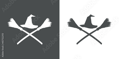 Tableau sur toile Logo con silueta de sombrero de bruja sobre 2 escobas cruzadas para su uso en in