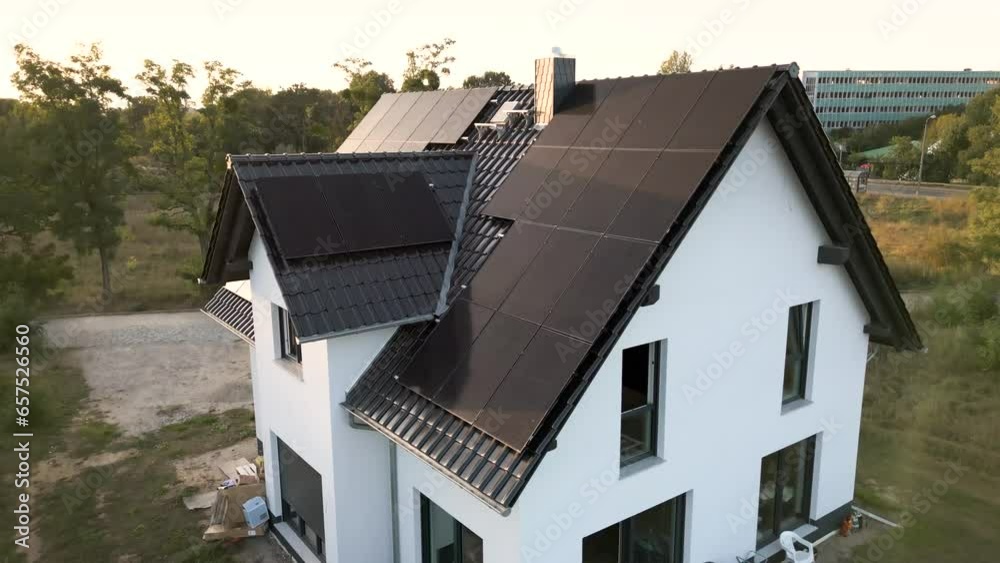 Aerial shot of a newly built single-family house with solar panels