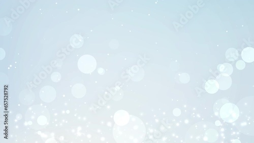 Particles shiny bokeh lights glow moving and flickering motion background. Abstract snowflake magic dust glittering light blurred for presentation luxury wedding,New year and Christmas festival. photo