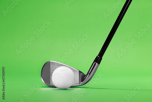 Fairway Iron Golf Club on a Green Background with Copy Space