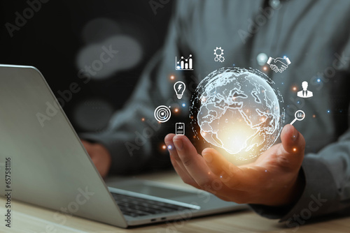 Businessman uses their hands to communicate Global connectivity, development, successful business concept Computer strategy, research, vision, network economy market technology background.
 photo