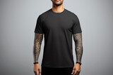 Black t-shirt mockup on a tattooed black man