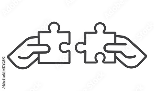 Two hands with a puzzle piece.