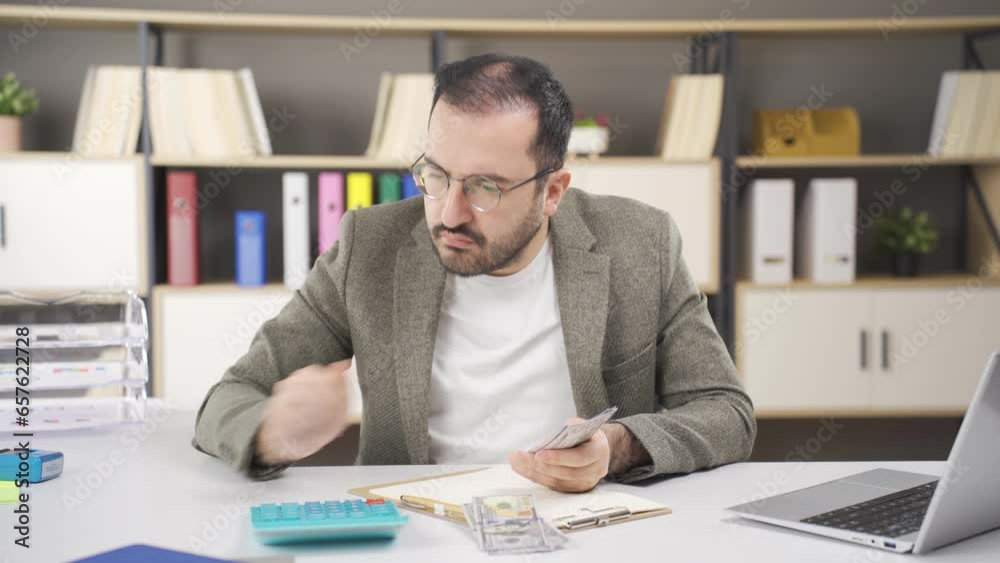 Office worker doing financial calculations. Office worker doing financial calculations.