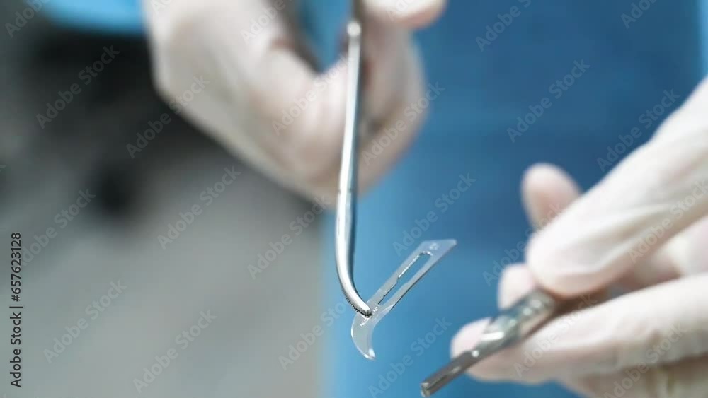 surgical instruments prepared and build up by female dental assistant in the operating room. surgical instruments prepared and build up by female dental assistant in the operating room.
