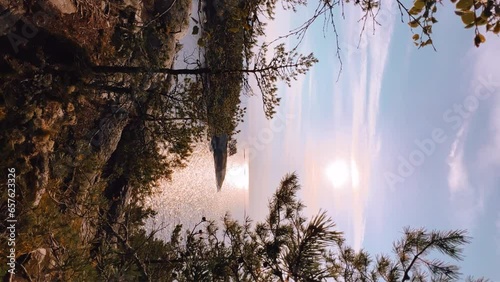 Russia, Karelia, Lake Ladoga, Koyonsaari. View of the coast of the island in a cold lake. Beautiful nature of the Republic of Karelia. Stunning panoramic view of the Ladoga Skerry Islands. 4K photo