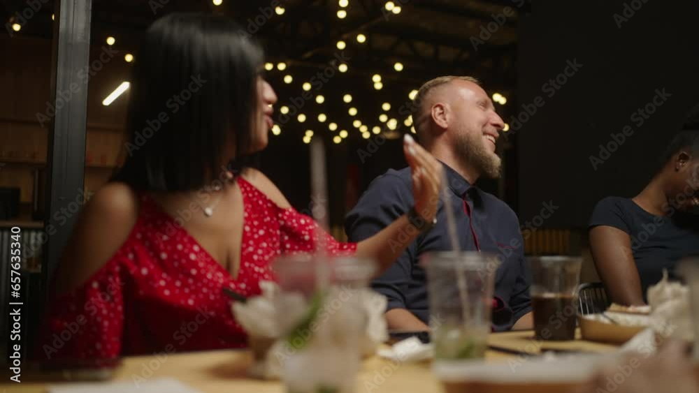 Happy Young Adult People Of Diverse Races And Ethnicities Dinning In Restaurant Together Happy Young Adult People Of Diverse Races And Ethnicities Dinning In Restaurant Together