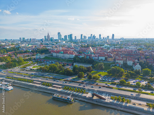 Aerial panorama of Warsaw, Poland over the Vistual river and City center in a distance Old town. Downtown skyscrapers cityscape. Business photo