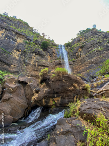 Sodong Waterfall located in Ciwaru Village, Ciemas District, Sukabumi Regency. One of several waterfalls which is a mainstay destination in the Ciletuh Unesco Unesco Global Geopark (CPUGGp). photo