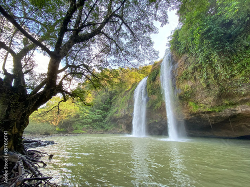 Sodong Waterfall located in Ciwaru Village  Ciemas District  Sukabumi Regency. One of several waterfalls which is a mainstay destination in the Ciletuh Unesco Unesco Global Geopark  CPUGGp . 