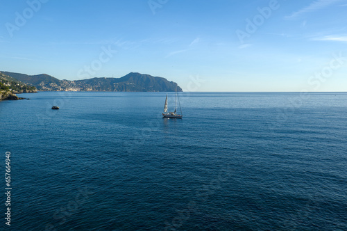 Sail boat in the sea at the coast of Italy