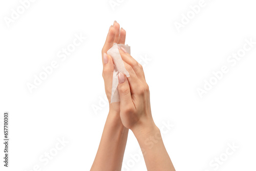 Wet wipe in a woman hand isolated on a white background. photo