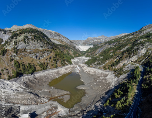 Obraz na płótnie Panoramic drone view of Koelnbrein Dam in the Hohe Tauern range, a part of the hydroelectric power plant in Municipality Malta, Carinthia, Austria. w salonie