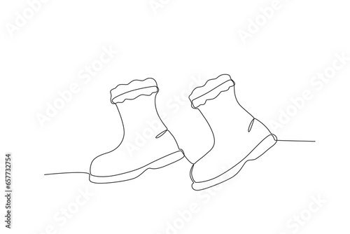 A shoe for the snow season. Winter one-line drawing