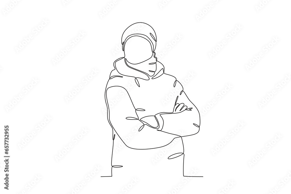 Fototapeta premium A man wearing winter clothes. Winter one-line drawing