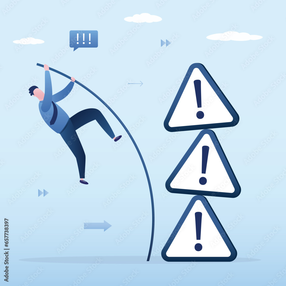 Confident businessman trying to jump through stack of warning signs ...