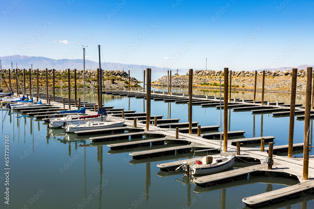 A floating marina on Great Salt Lake, Utah, USA with a few sailboats.
