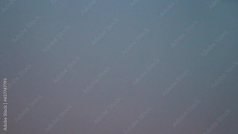 Thunder bolts and lightning bolts in grey clouds evening sky in severe thunderstorm with heavy lightning and flashing electricity in extreme weather shows force of nature striking through cloudscape