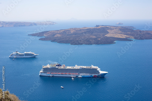 Big ferry boat sailing across the bay in Santorini, Greece