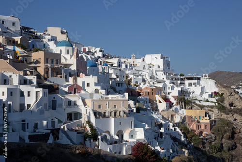 Touristic village landscape on the top of a cliff in Santorini © jordieasy