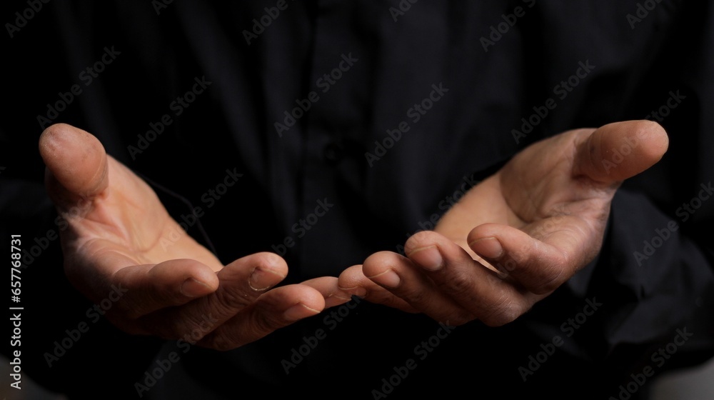 black man praying to god with hands together on black background with people stock image stock photo - obrazy, fototapety, plakaty 
