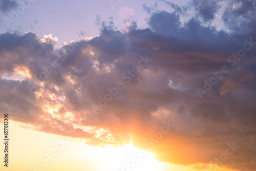 bright cloudy sky at sunset on an autumn evening. Cloud landscape. Background for text © Natalia