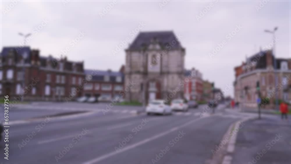 Traffic and people traffic near Porte Notre-Dame in Cambrai. Background, blurry video. Traffic and people traffic near Porte Notre-Dame in Cambrai. Background, blurry video.