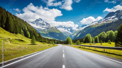 Asphalt road in Austria Alps in a summer day
