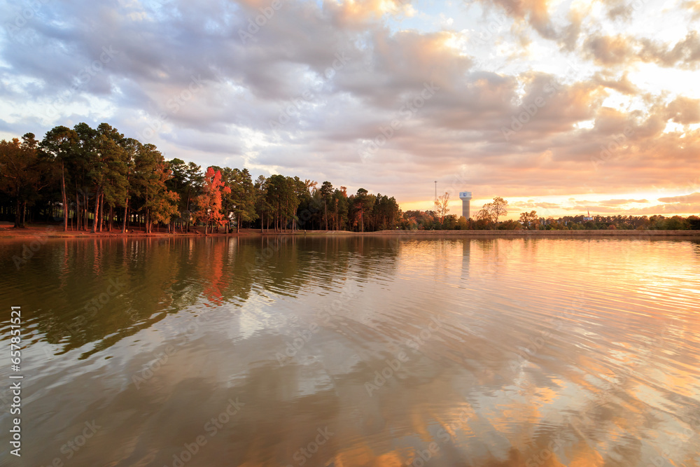 Autumn Sunset At The Longview Water Tower with a lake and sunset clouds - obrazy, fototapety, plakaty 