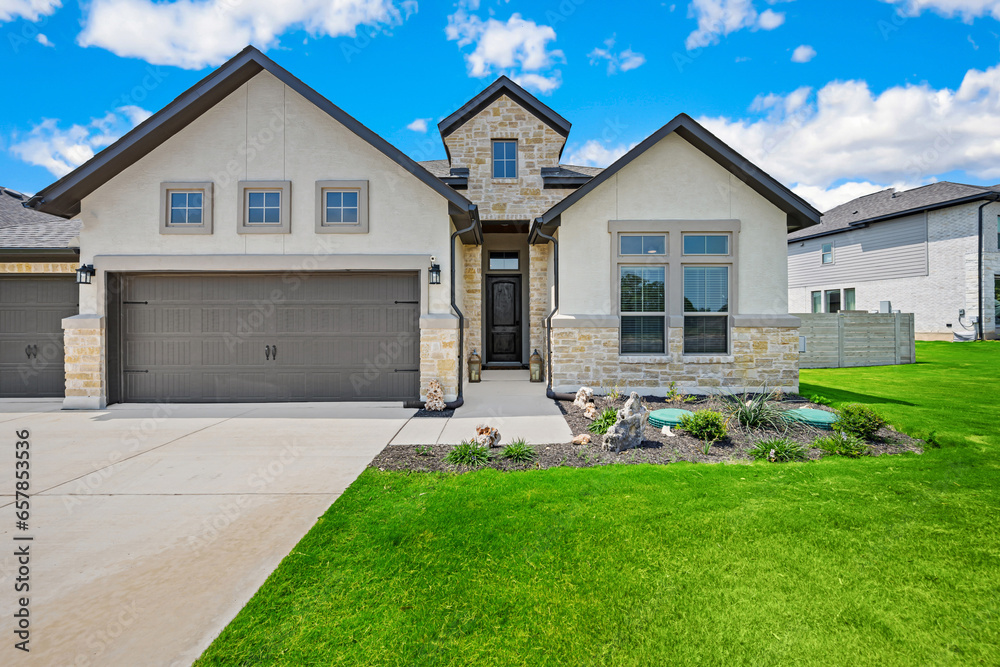 a family home with a green lawn a family home with a green lawn