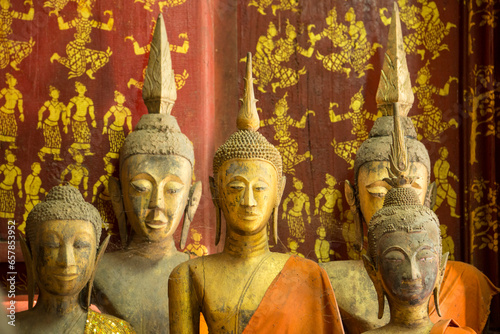 Bronze statues inside Wat Xieng Thong Monastery; Luang Prabang, Laos photo