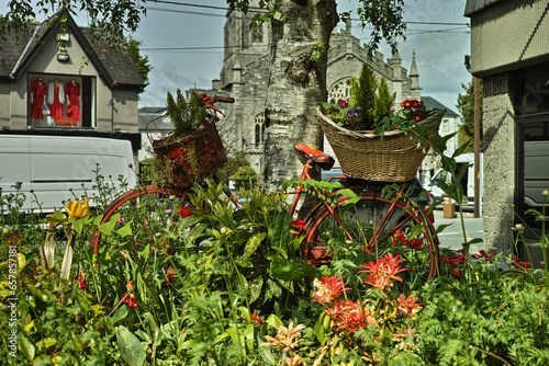 old bicycle covered in flowers