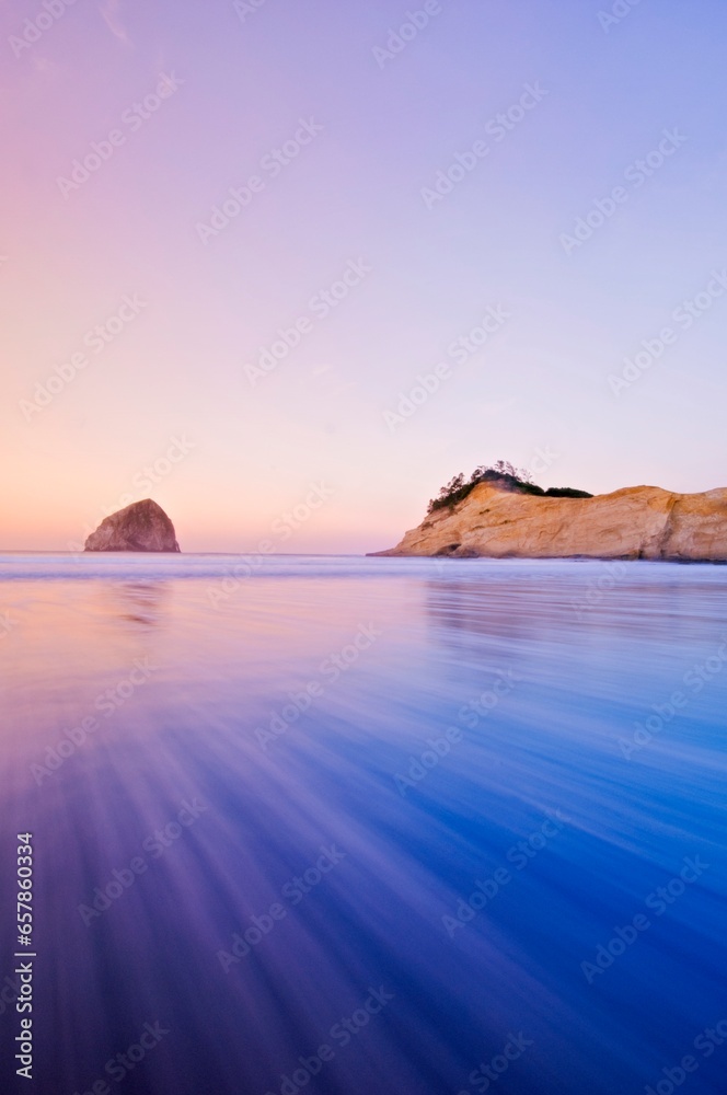 Haystack Rock In Cape Kiwanda At Dawn; Pacific City, Oregon, Usa Haystack Rock In Cape Kiwanda At Dawn; Pacific City, Oregon, Usa